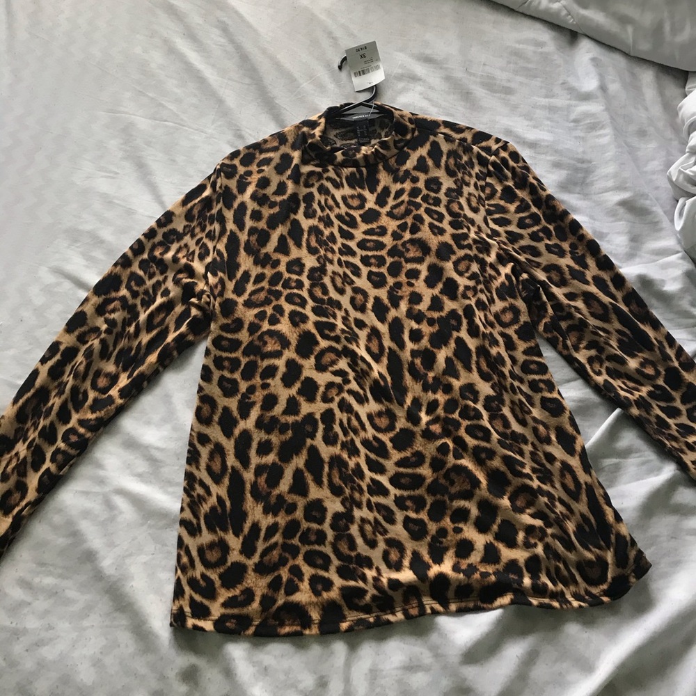 A cheetah print long sleeve top